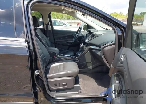 2016 Ford Escape Titanium z USA, uszkodzony, nr VIN 1FMCU0JX8GUB03579